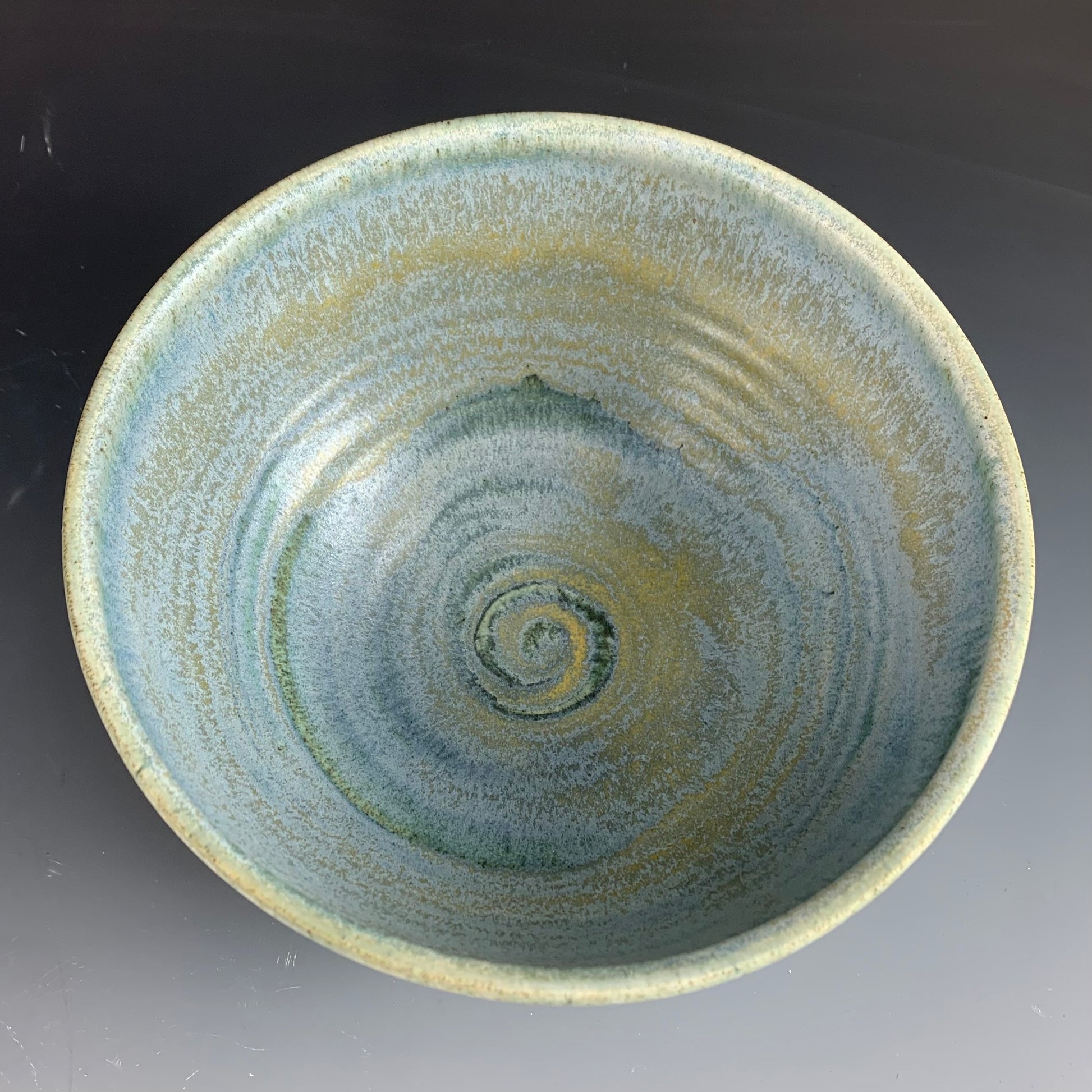 Above view of Blue Ramen Bowl on Dark Background