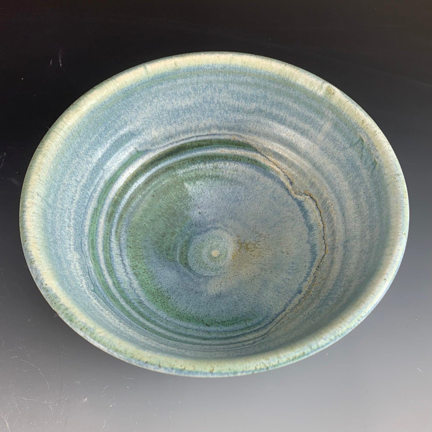 Above View of Blue Ramen Bowl on Dark Background