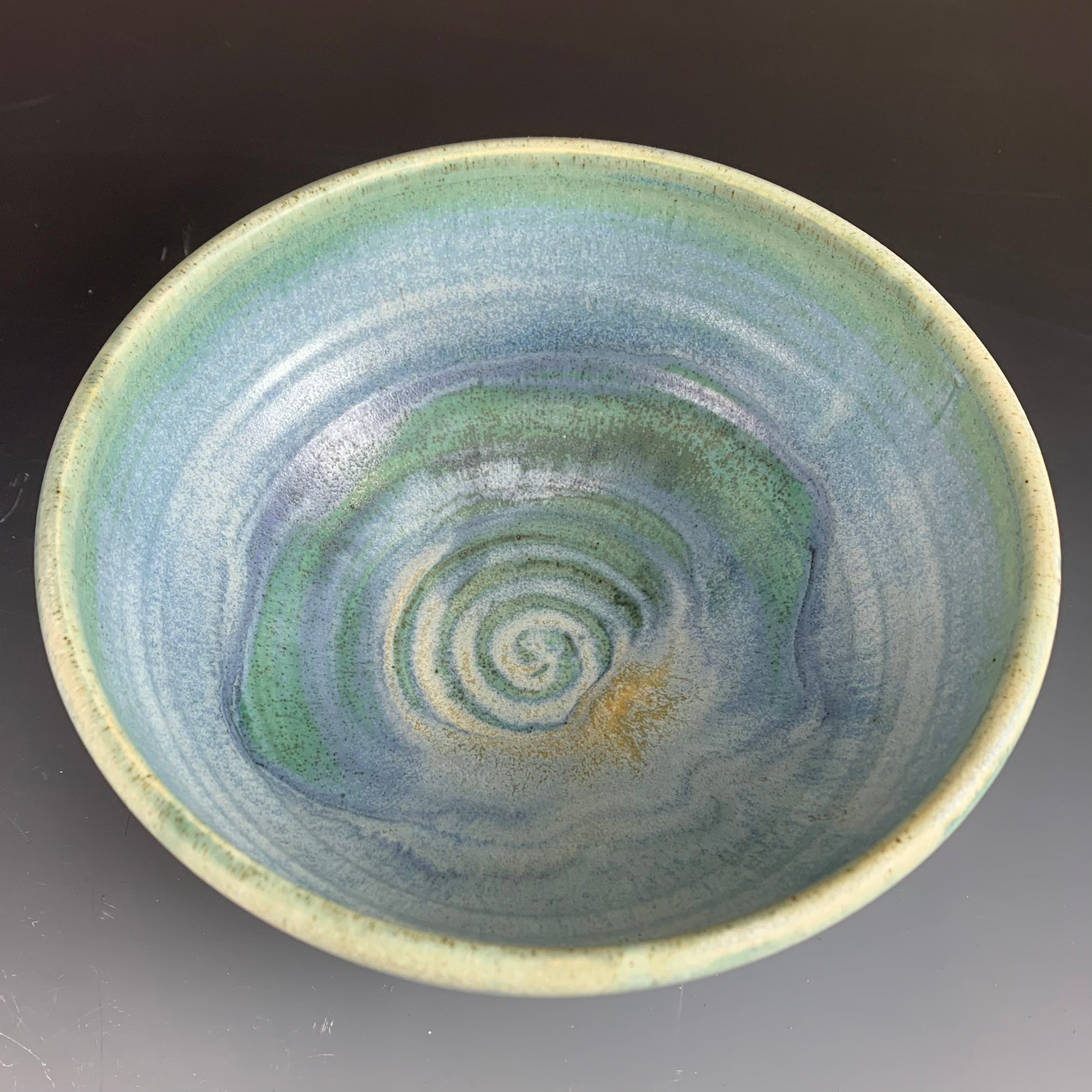 Above View of Blue Ramen Bowl on Dark Background