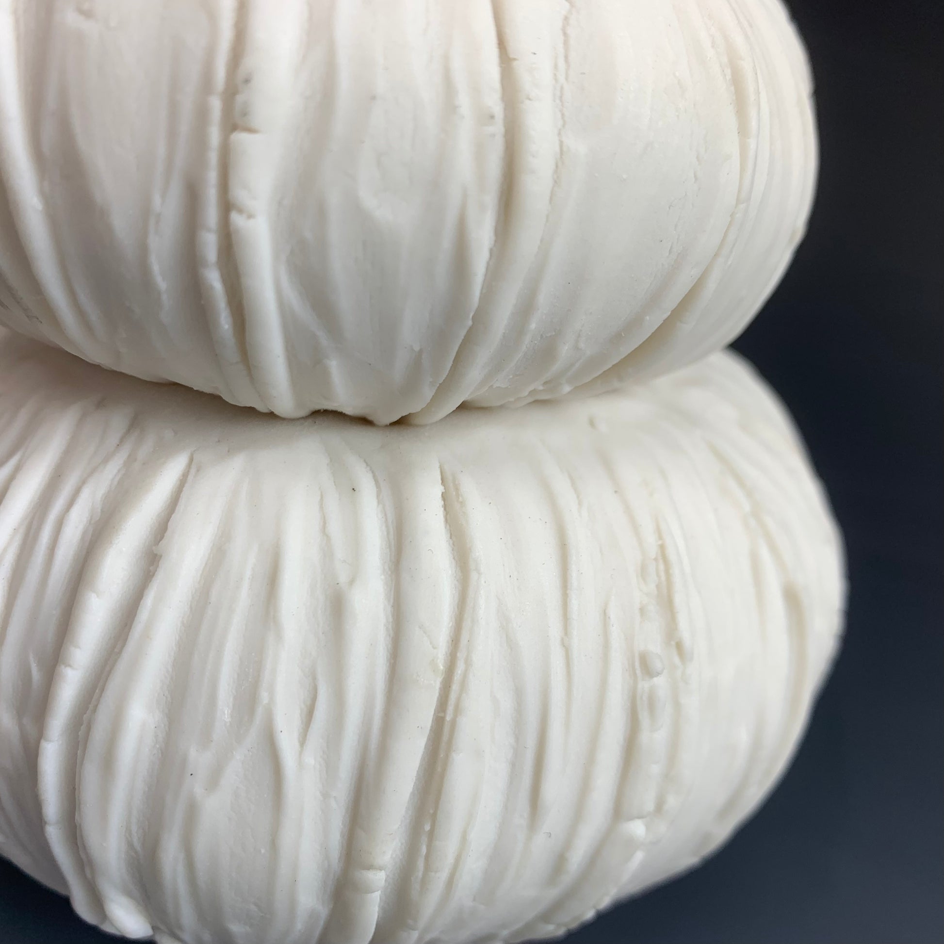 Detail of texture of White Porcelain Vase on dark background