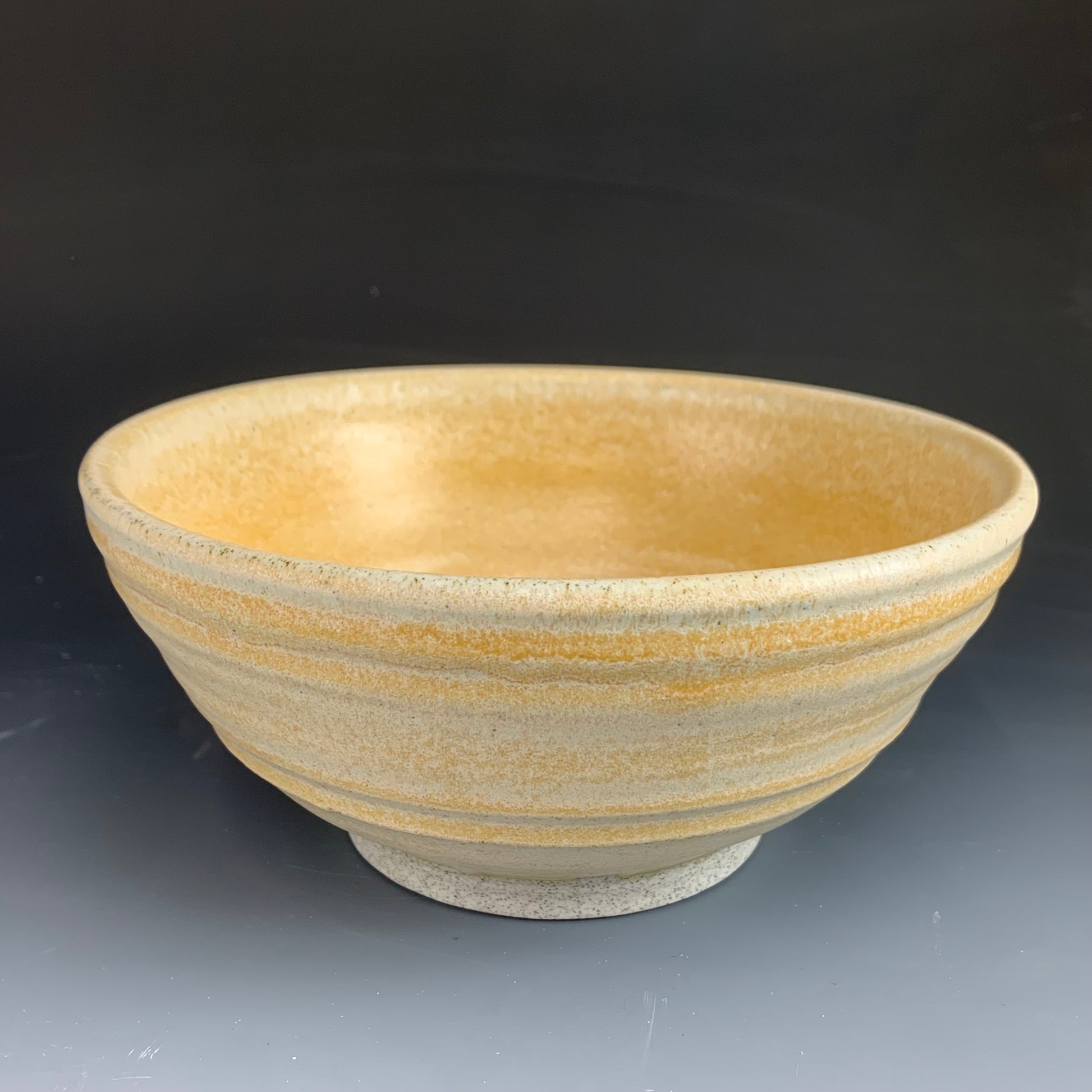 Yellow Ramen Bowl on Dark Background